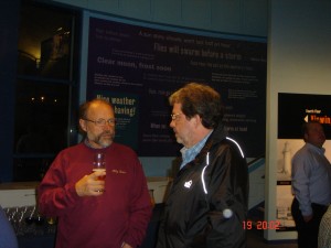 DSC02935 Mark Hilmann (Milly Brown) talks with Phil, Pat's brother and Boat Builder.
